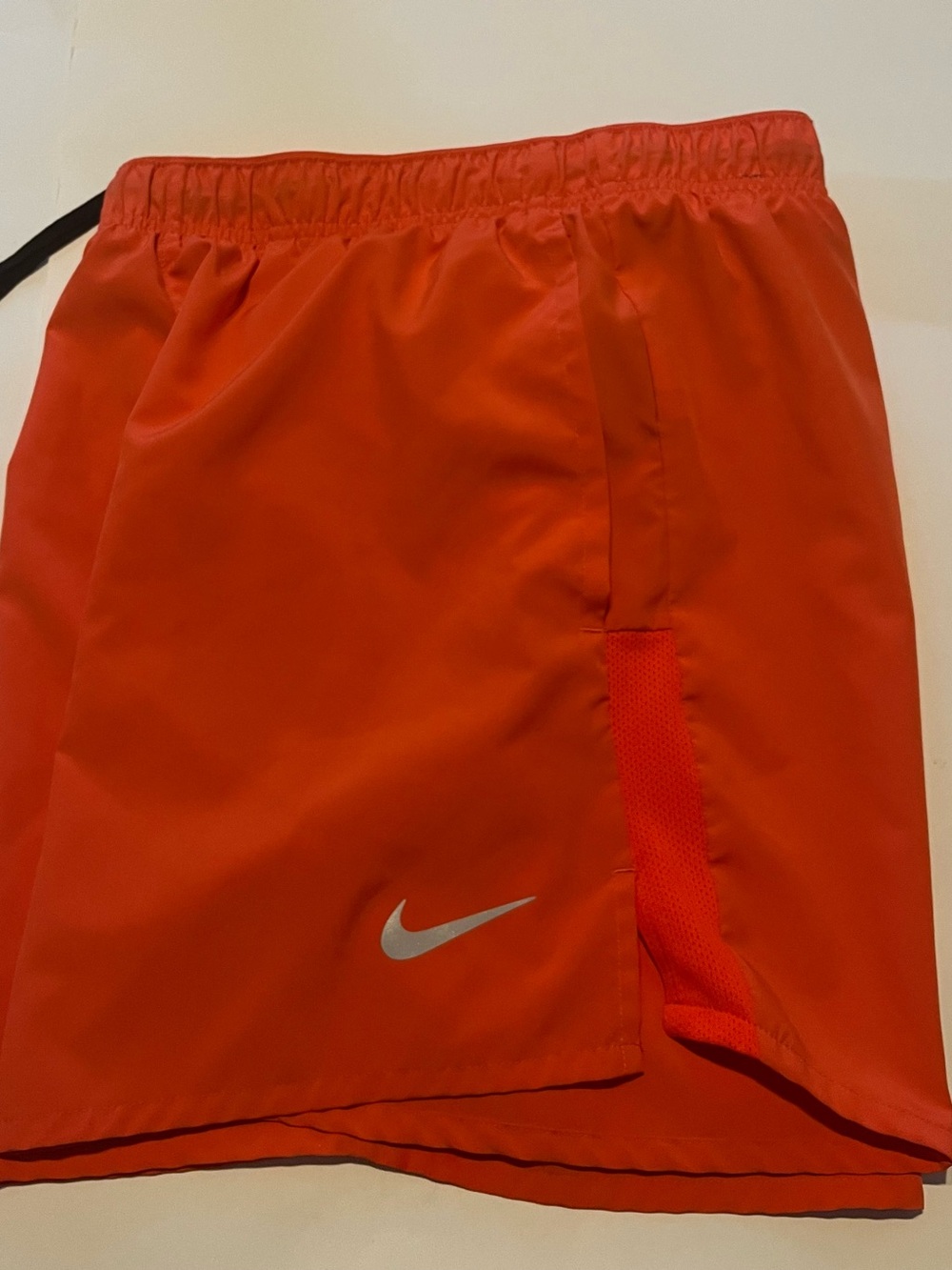 Nike Men's Bright Orange Athletic Shorts with Reflective Swoosh